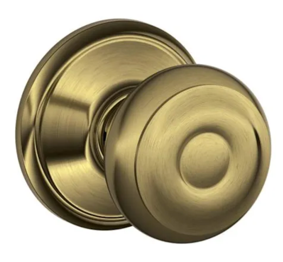Schlage Georgian Passage Door Knob Set Antique Brass F10GEO609